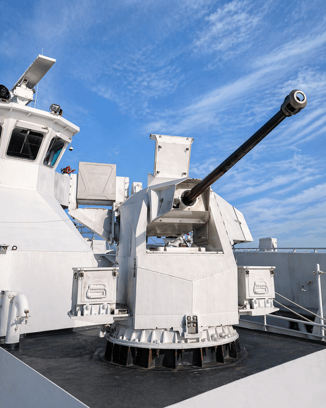30mm remote controlled naval weapon system mounted on ship deck